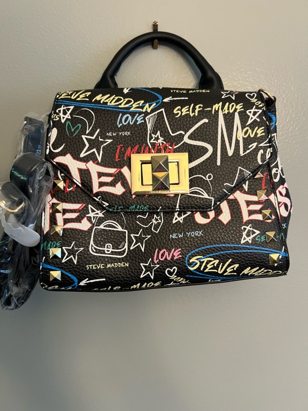 Steve Madden Black Graffiti-Print crossbody bag